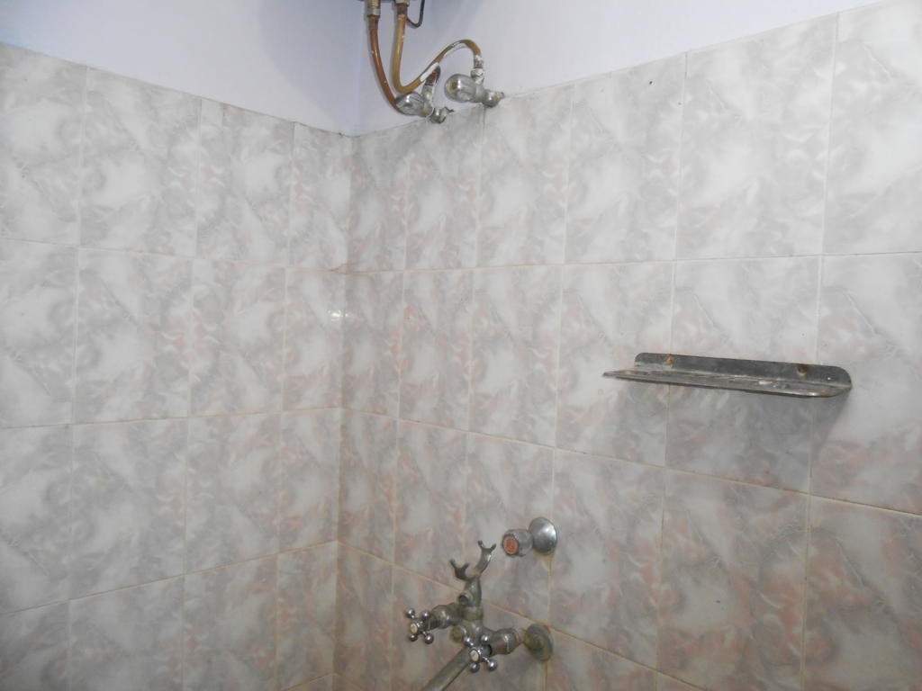 Hotel Sonmony Varanasi Værelse billede